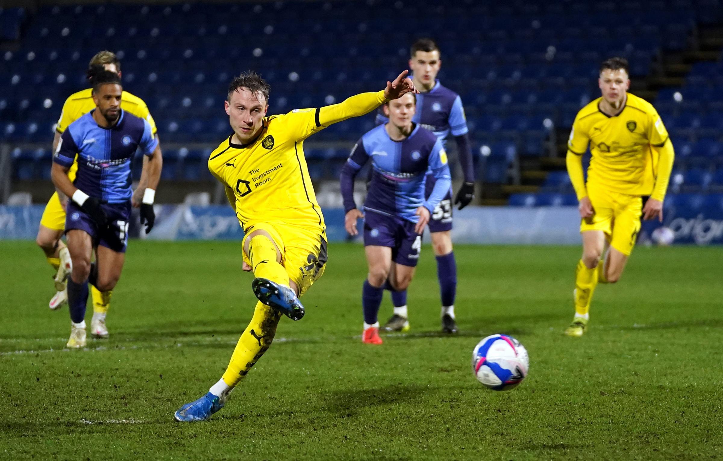 Cauley Woodrow scored Barnsleys first goal of the match against Wycombe on Wednesday night with a penalty (John Walton/PA)